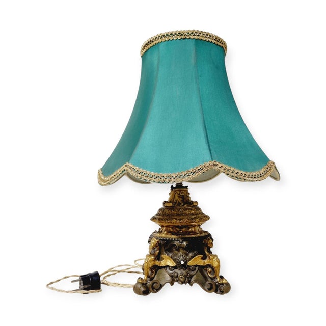 Table lamp made of bronze, made in the second half of the 19th century in the historicizing style. This style uses...