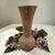 The McCoy Brocade vase featured distinctive mottled glazes with pink and cream. This vase was created using a sponge or...