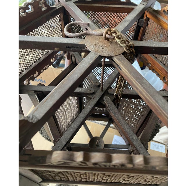 Vintage Reticulated Large Wood Hanging Lanterns with Metal Hanging Hooks and Dragon Head Carvings. Unusual find to have a...