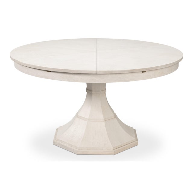 Angled strips radiate across an expanding top that measures 85 1/2 inches when open, with room for ten chairs. Closed it...