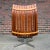 Teak slat back chair with an uncommon cushion design with ottoman truly a rare piece. Ottoman measurements- 21.5” W x 18”...