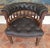 Large English Oak and Brown Leather Office Chair, circa 1830–1840 Material: Country oak, leather and brass A substantial...