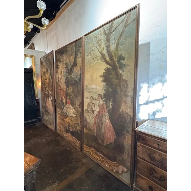 This product is a set of French 18th century oil on canvas paintings depicting courting scenes. Each painting captures...