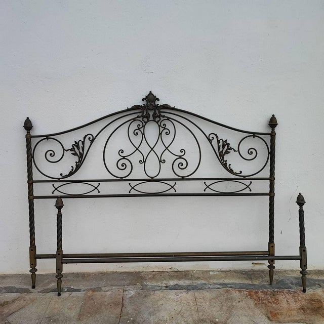 Antique metal bed with twists and decorations Height: 141 Width: 180 This piece is attributed to the mentioned...