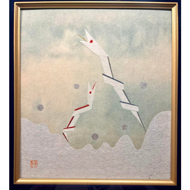 Vintage Japanese paper collage artwork depicting two stylized serpents or snakes emerging through a dreamy abstract...