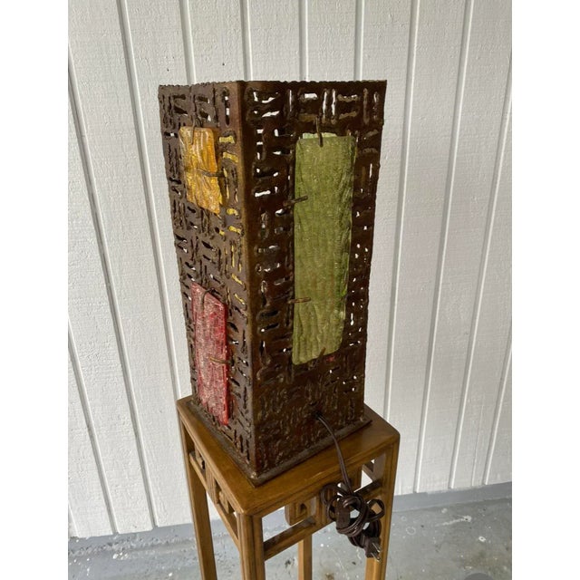 Unusual brutalist metal (probably steel is magnetic) and thick cubist panels of art glass. As much a sculpture as it is a...