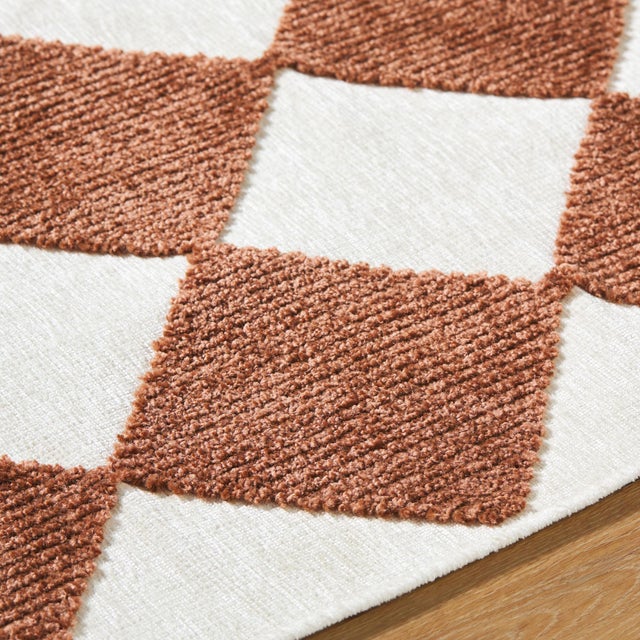 Introducing the Lyna area rug, a magnificent blend of Art Deco Modern style and practicality. This rug is made from a...