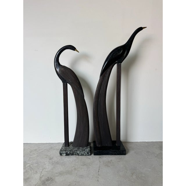 Elegant pair of 1980’s Maitland Smith style peacock bird sculptures, beautifully crafted from tessellated black stone and...