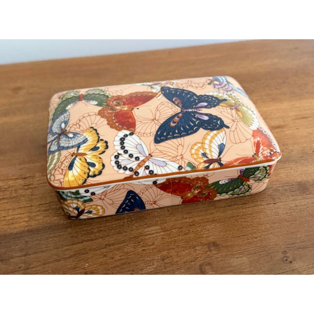 Pretty porcelain butterfly box, made for Neiman Marcus. Originally made for decks of cards, it's perfect to store some...