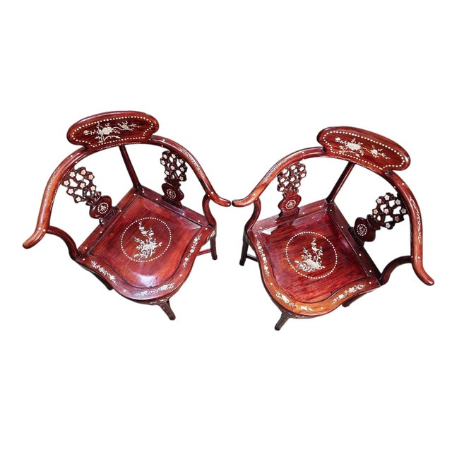 Stunning pair of 20th century Ming style Chinese corner chairs, both in excellent condition. Mother or Pearl and abalone...