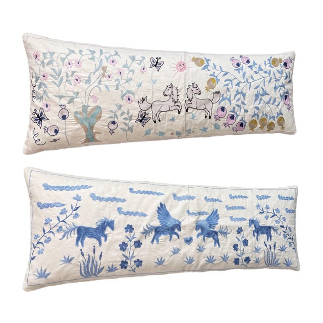 This beautiful 17'' x 53'' & 18'' x 54'' hand-embroidered Suzani pillow cover set was made from authentic Uzbek cotton...