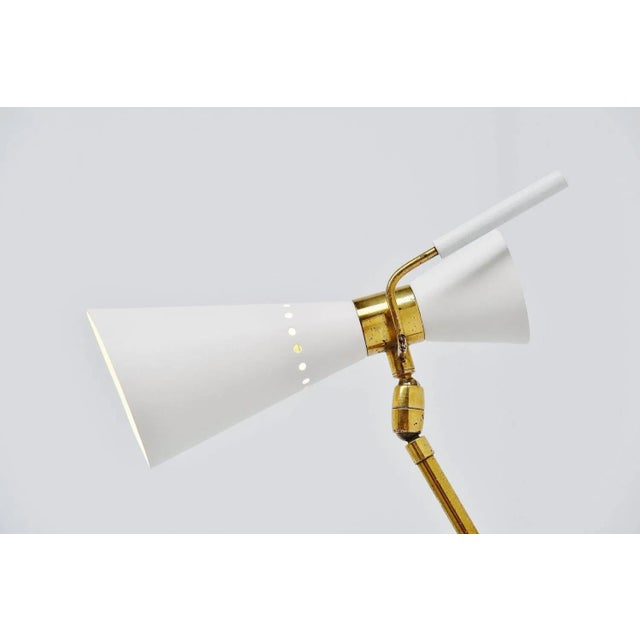 Very nice and adjustable wall lamp attributed to Stilnovo, Italy, 1950. This is for a very nice modernist shaped wall lamp...