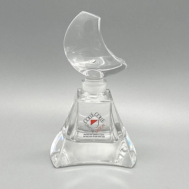 This is a modern lead crystal perfume bottle with stopper by Italy Colle Crystal Design.