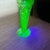 Glows under black light; stands 11” tall; no makers mark; beautifully made.