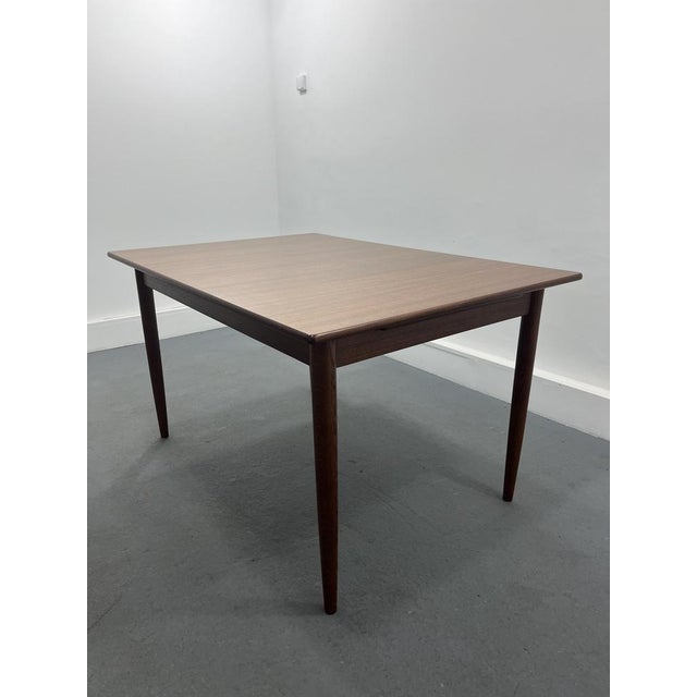 Vintage design. Scandinavian teak dining table. Designed by yngve ekström. Suitable for four to eight people. Completely...