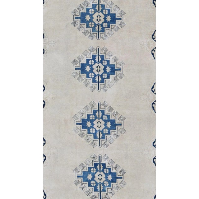 Turkish vintage Oushak rug with Medallion geometric design in blue and cream, Keivan Woven Arts / rug en-165347, country...
