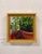 This artwork depicts a close-up view of a potted plant, showcasing vibrant greens against a textured surface. The...
