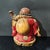 Invite joy, abundance, and positive energy into your home with this charming Vintage Shiwan Ware Laughing Buddha...
