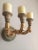 I purchased these candle sconces (not electrified) for over $800 at an antique store about ten years’ ago even though...