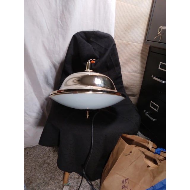 This is a 1960's brass and glass semi bell pendant hard wire ready either flush mount or on any link of its 33" attached...