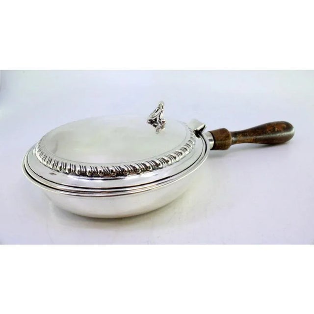 Silver Whisk with Raised Border Lid and Wooden Handle, in Very Good conditions. Designed from 2000 This piece has an...