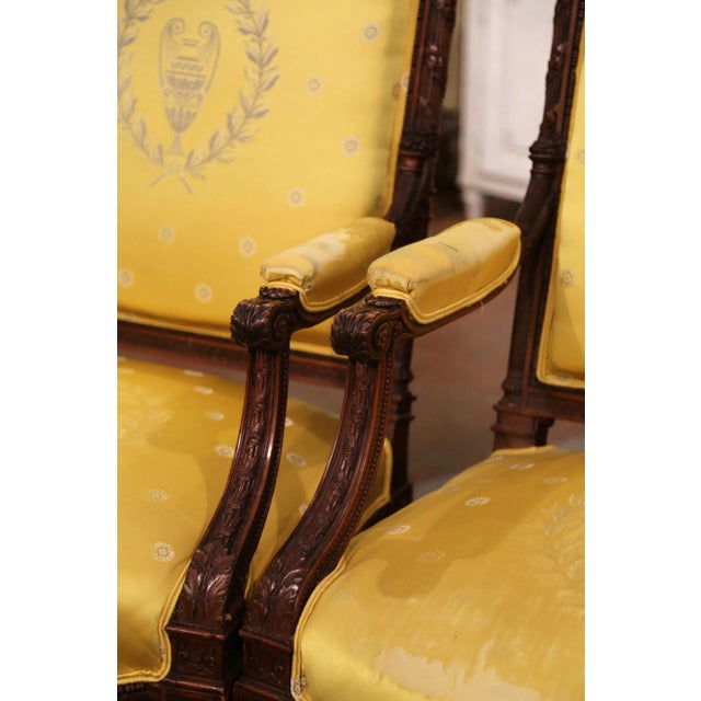 Pair of 19th Century French Louis XVI Walnut Fauteuils With Eagle Crest For Sale - Image 4 of 10