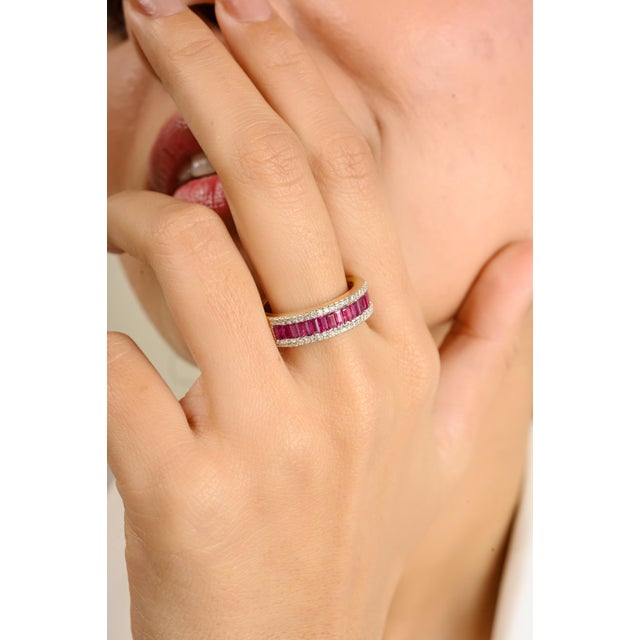 1.35 Carat Baguette Cut Ruby & Diamond Eternity Band Ring in 14k Yellow Gold featuring natural ruby of 1.35 carats and...