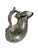 Sterling silver askos jug, a specific style of antique pitcher. It is modeled to resemble an ancient greek vessel made...