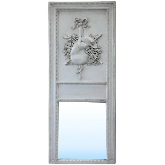 Here is a gorgeous 19th Century Country French Painted Louis XVI Style Trumeau Mirror boasting its original patina grey...