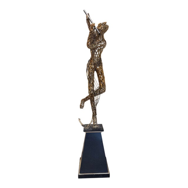 Gold Tone “Woman Playing Flute” Recycled Steel Sculpture on Pedestal For Sale