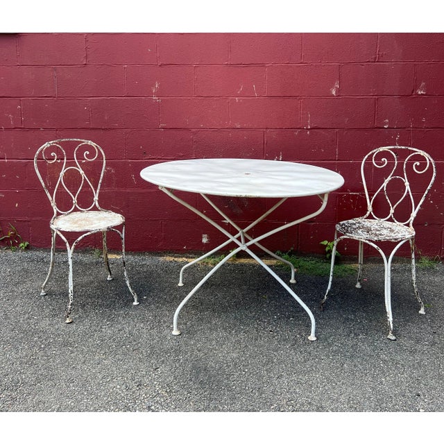 This large French 1920s white painted garden table is the epitome of elegance and will certainly evoke the charm and...