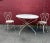 This large French 1920s white painted garden table is the epitome of elegance and will certainly evoke the charm and...