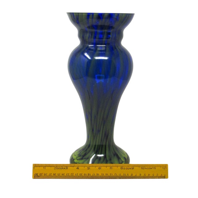 A Justyna Krosno cobalt blue and yellow glass vase. Standing nearly 15 inches tall and 6 inches wide, this elegant...