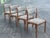 (4) Mid Century Danish Modern J. L. Moller Set Of Dining Chairs. These sleek teak chairs are very stylish with a timeless...