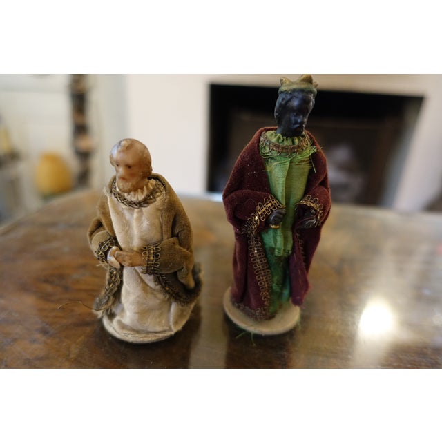 Superb set of 14 antique figurines wax for faces and hands fabric for clothed bodies on a cardboard base ranging from 11...
