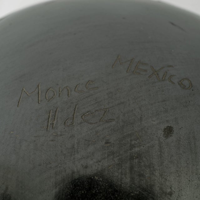 A vintage Mata Ortiz Large black pottery vase from Mexico signed by Monce Hernandez. It is a beautiful example of Mata...