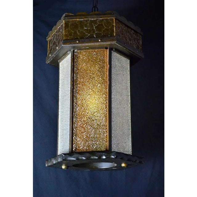 Monumental hanging swag lamp from the mid century era for any eclectic bohemian decor. Ideal in an entryway, stairwell or...