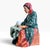 Vintage Royal Doulton "Fortune Teller" hand-painted porcelain figurine featured sitting at a table with crystal ball,...