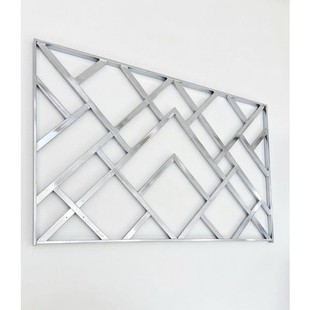 This Regency Chrome DIA Fretwork King Headboard from the 1970s exudes mid-century modern glam with its polished chrome...