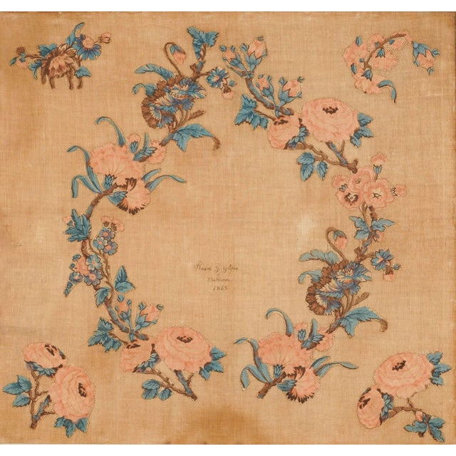 Cotton quilt square with floral appliques cut from a printed chintz and redesigned as a wreath with floral sprigs in the...