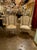 This is a pair of 19th Century French Louis XVI Bergères that feature intricate carvings and a painted finish. The chairs...