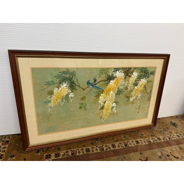 Design Plus Gallery presents a Bird with Flower Painting with Asian Style and Signature. The artwork has two small blue...