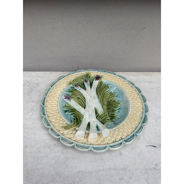 Colorful Majolica asparagus and artichoke plate Salins, circa 1890.