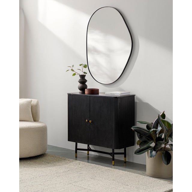 Reimagine your living space with the Aamnah Mirror, an epitome of minimalist modern style straight from India. This...