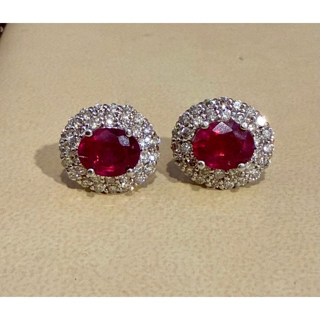 Metal 6 Ct Oval Treated Ruby & 2 Ct Double Halo Diamond Stud Earrings 14k White Gold For Sale - Image 7 of 8