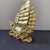 This is a finely cast antique gilt bronze sculpture of a treasure ship, a traditional symbol of prosperity and successful...