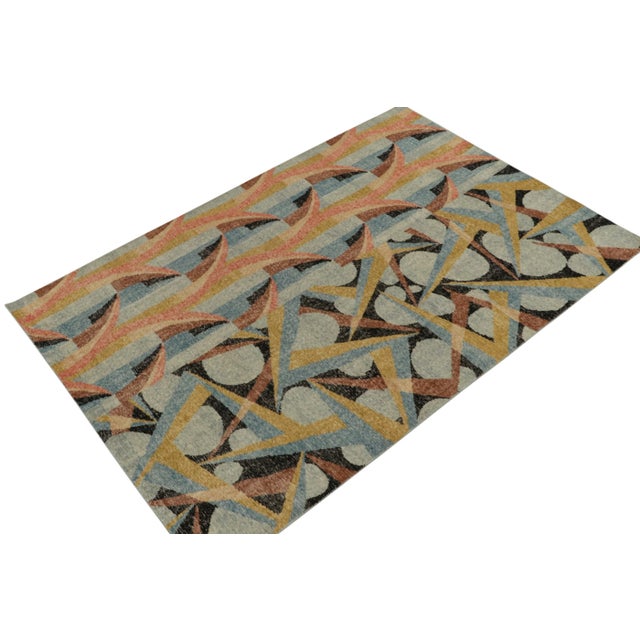 A scintillating 6x9 hand-knotted wool rug from Rug & Kilim’s Homage Collection; a bold textural encyclopedia of patterns...