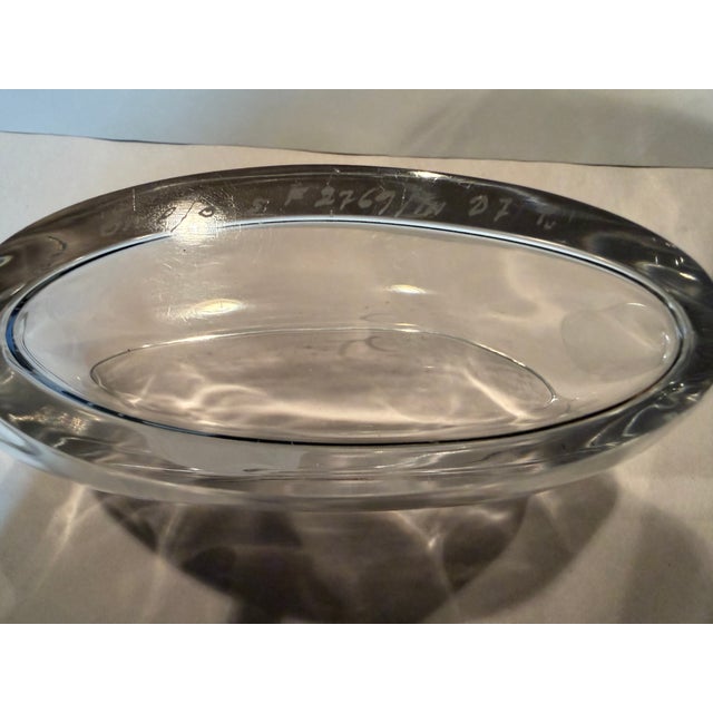 Vintage Orrefors engraved crystal vase in "Wish to the Moon" pattern created by Edvin Ohrstrom in 1942. It shows a young...