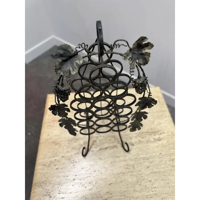 78cm high x 49cm wide x 36cm deep This wine rack was made by a french forging master for his wife in the 1960s.A beautiful...