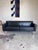 2010s Black Leather and Chrome Theatre Sofa by DWR For Sale - Image 5 of 8